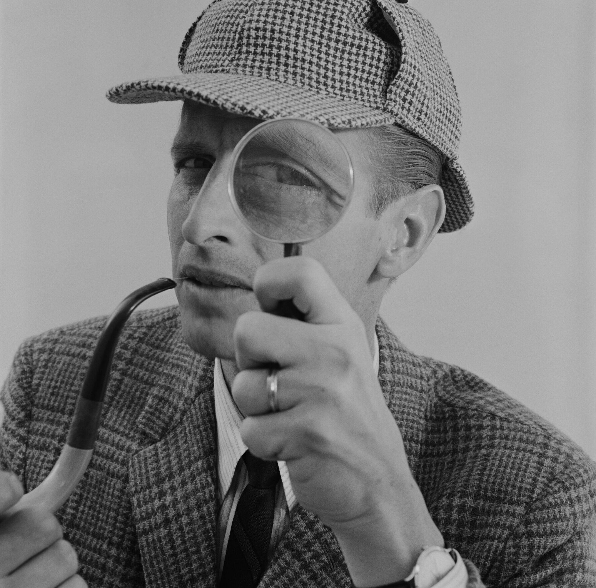 Detective with a magnifying glass