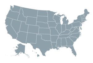 A simplified map of the United States in a neutral gray color, representing the nationwide scope of compliance regulations and governance requirements