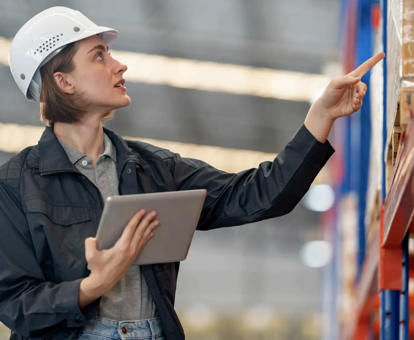 Woman in hard hat working