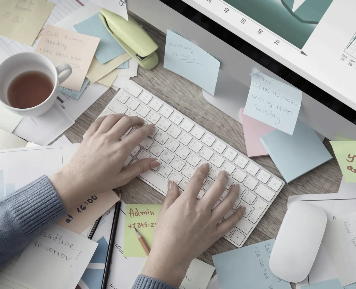 Person typing on keyboard